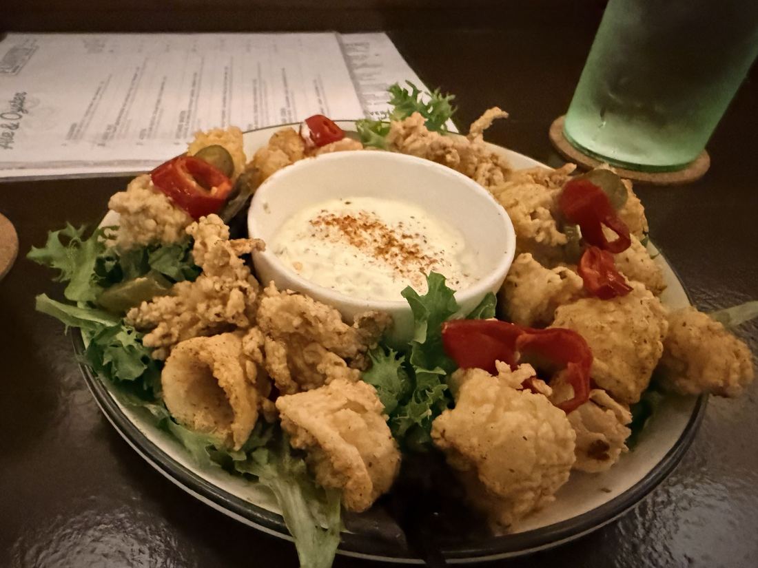 Dinner in Albany. Fried calamari with pickled peppers.