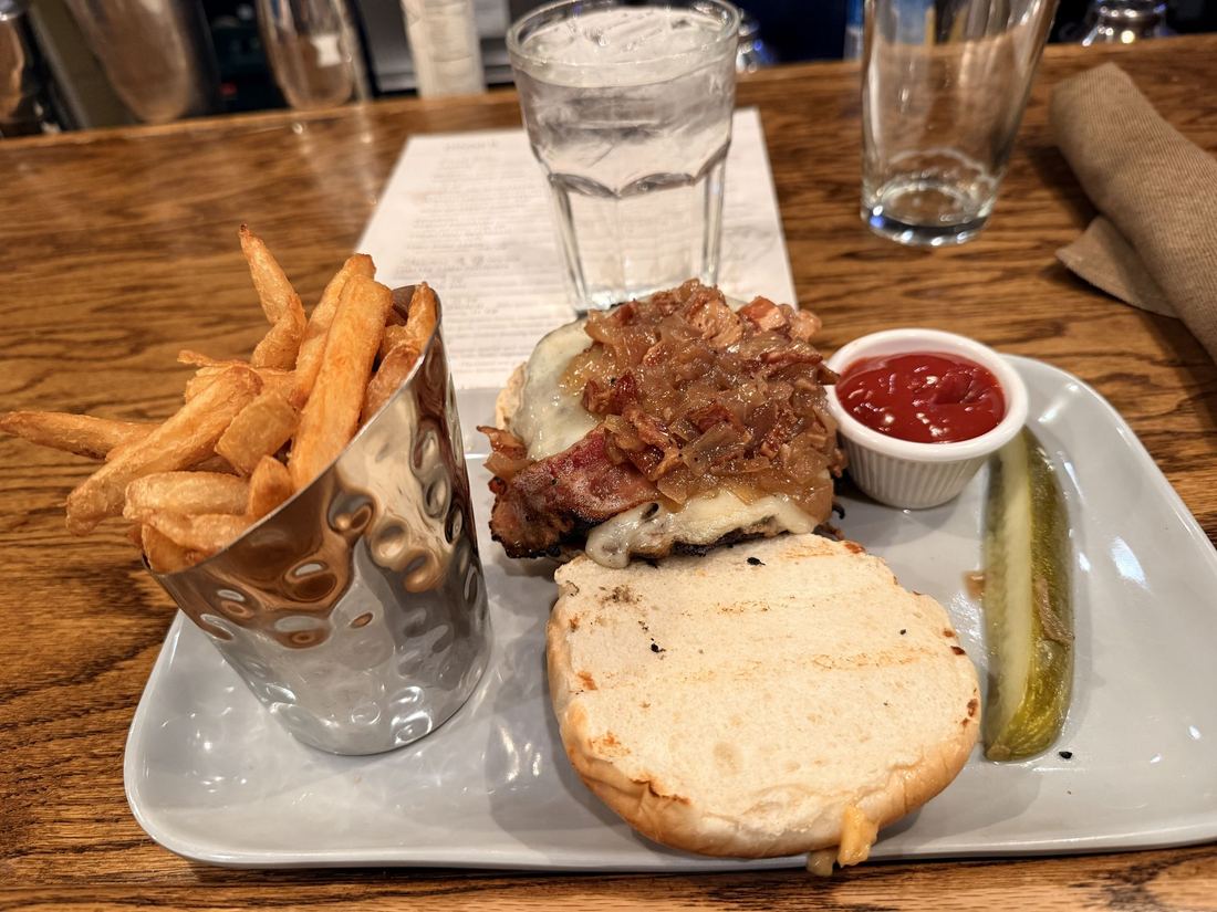 PB&J burger, Common Man. A PB&J burger with fries and a pickle at the Common Man in Lincoln, New Hampshire.