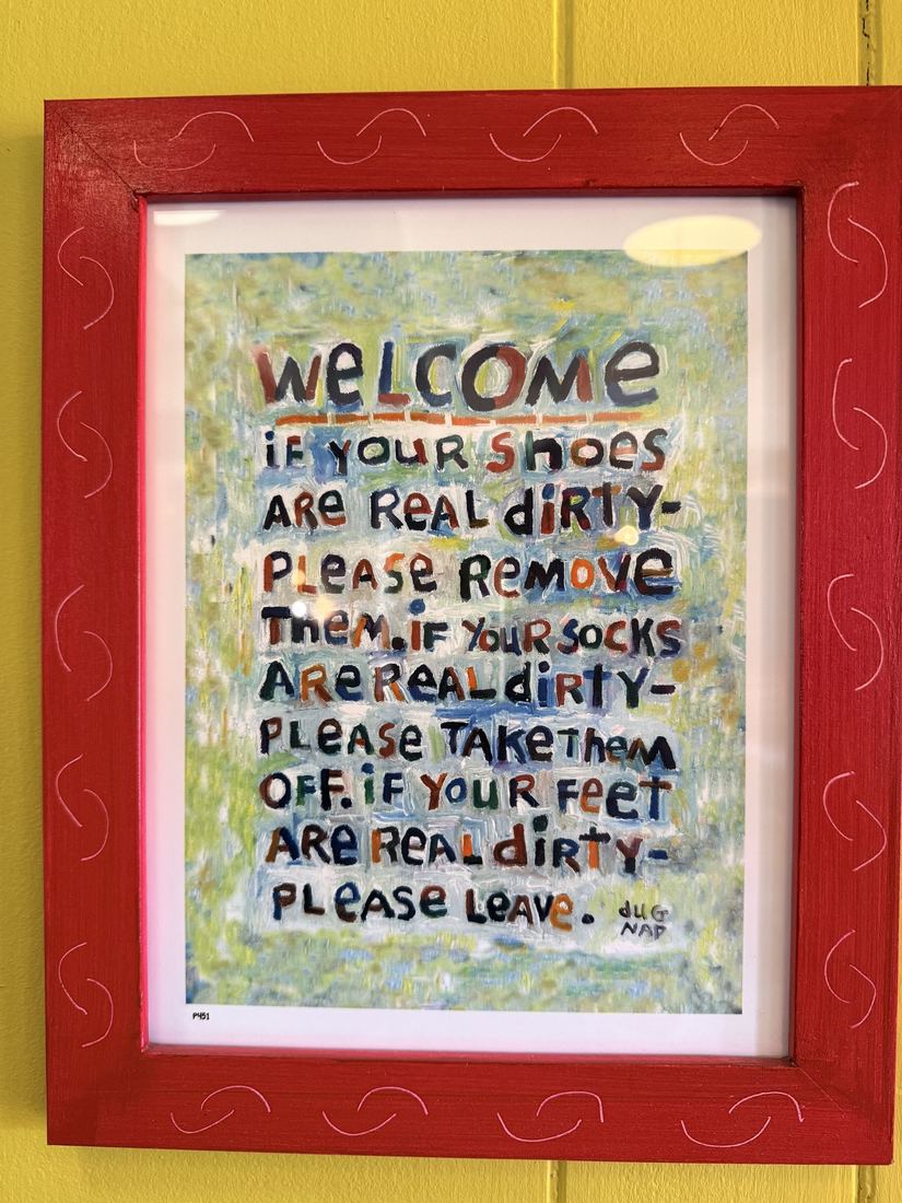 Hostel Tevere, Warren. House rules, framed: if your feet are real dirty, please leave.